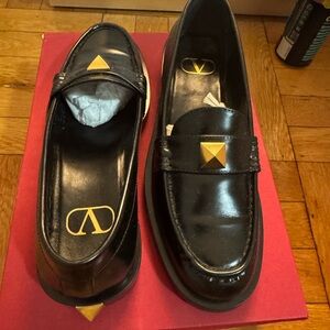 Valentino Garavani Black Leather Loafers with Gold Studs